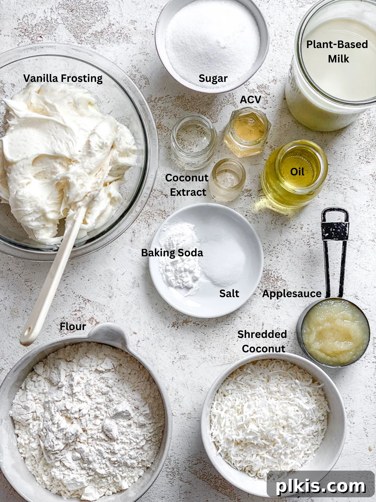 Tropical Coconut Bliss 3 Ingredients for Vegan Coconut Cake measured out on a white surface.