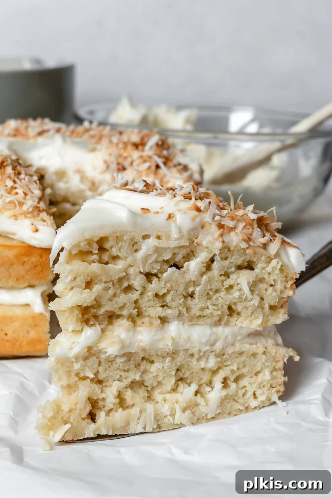Tropical Coconut Bliss 9 Completed Vegan Coconut Cake on white surface.