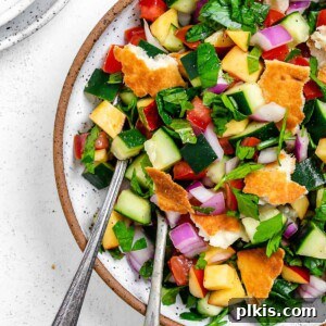 Zesty Fattoush Crunch 11 Completed Easy Summer Fattoush Salad in a white bowl against a light background