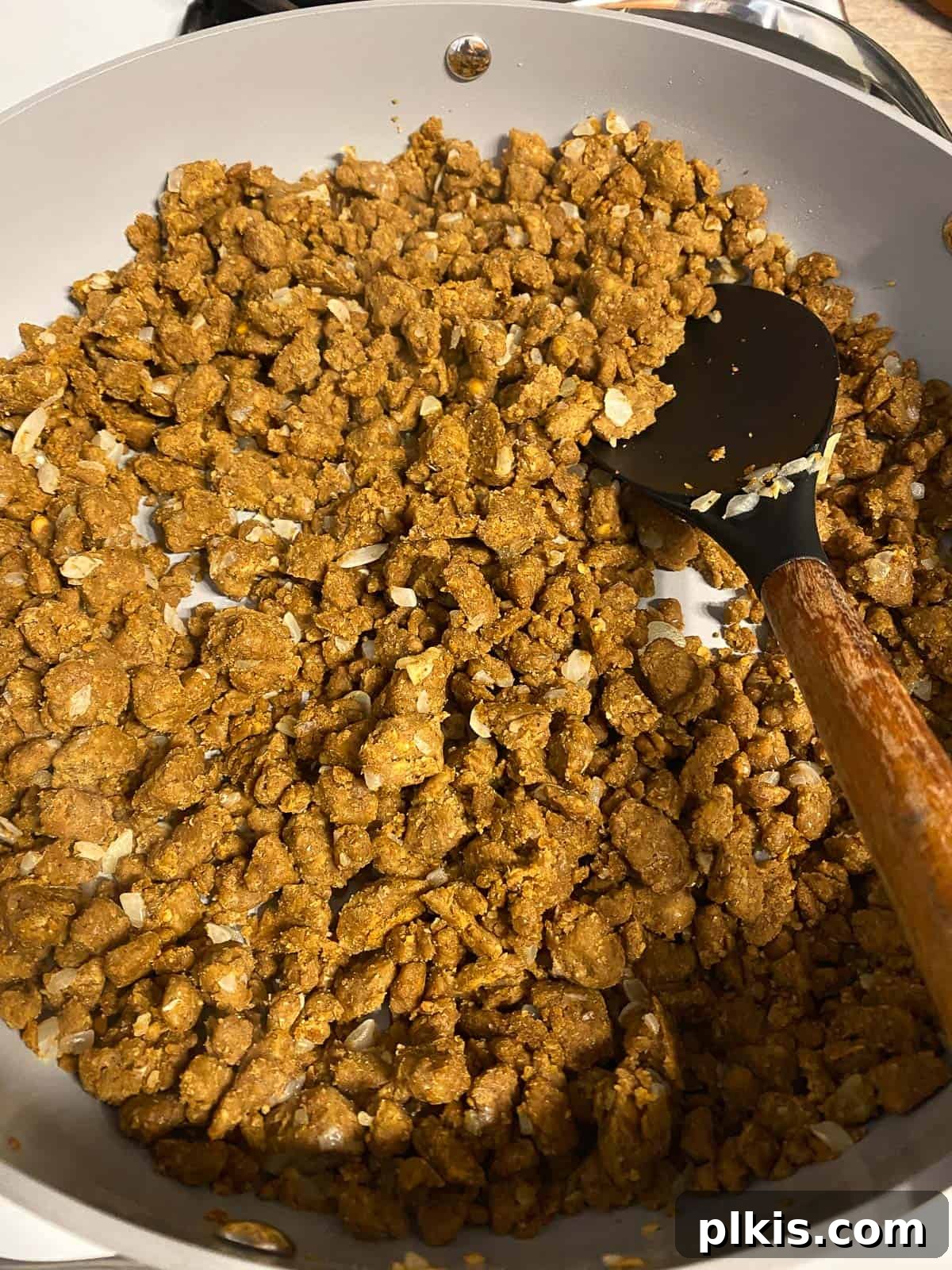 Hearty Plant-Based Lentil Street Tacos 14 process shot of mixing ingredients together in pan