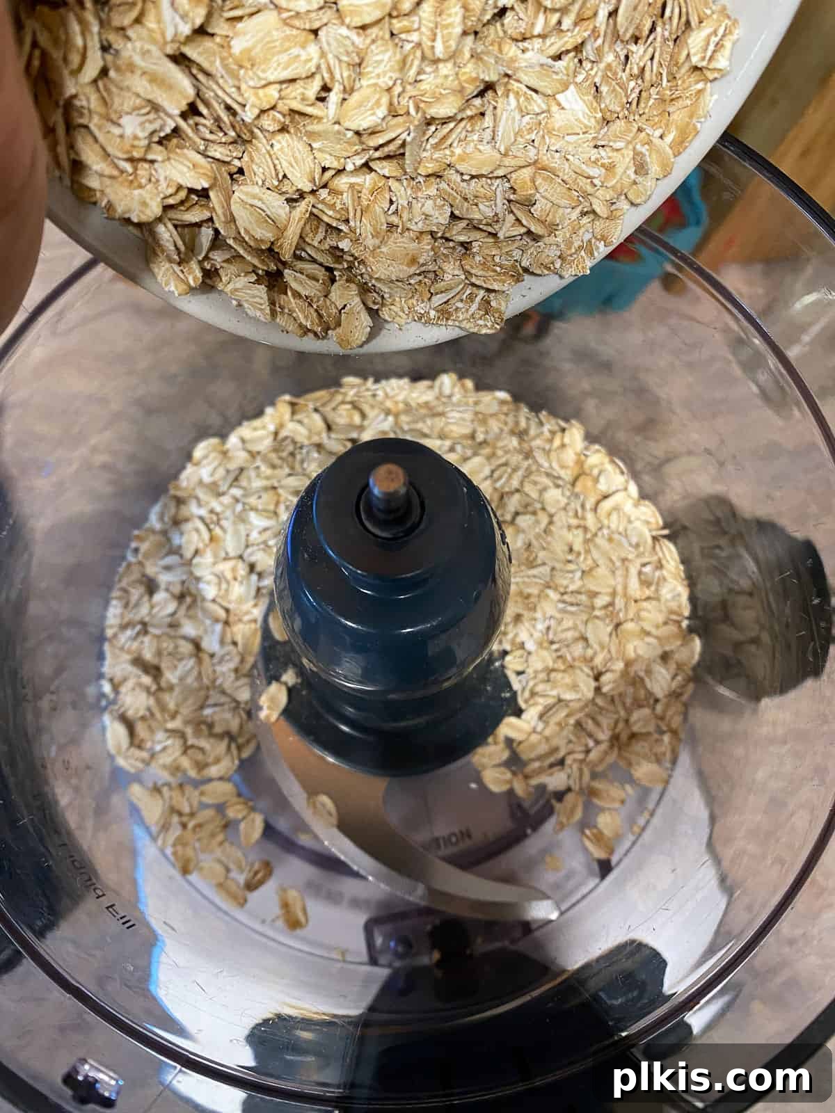 Hearty Plant-Based Lentil Street Tacos 6 process shot of adding oats to food processor