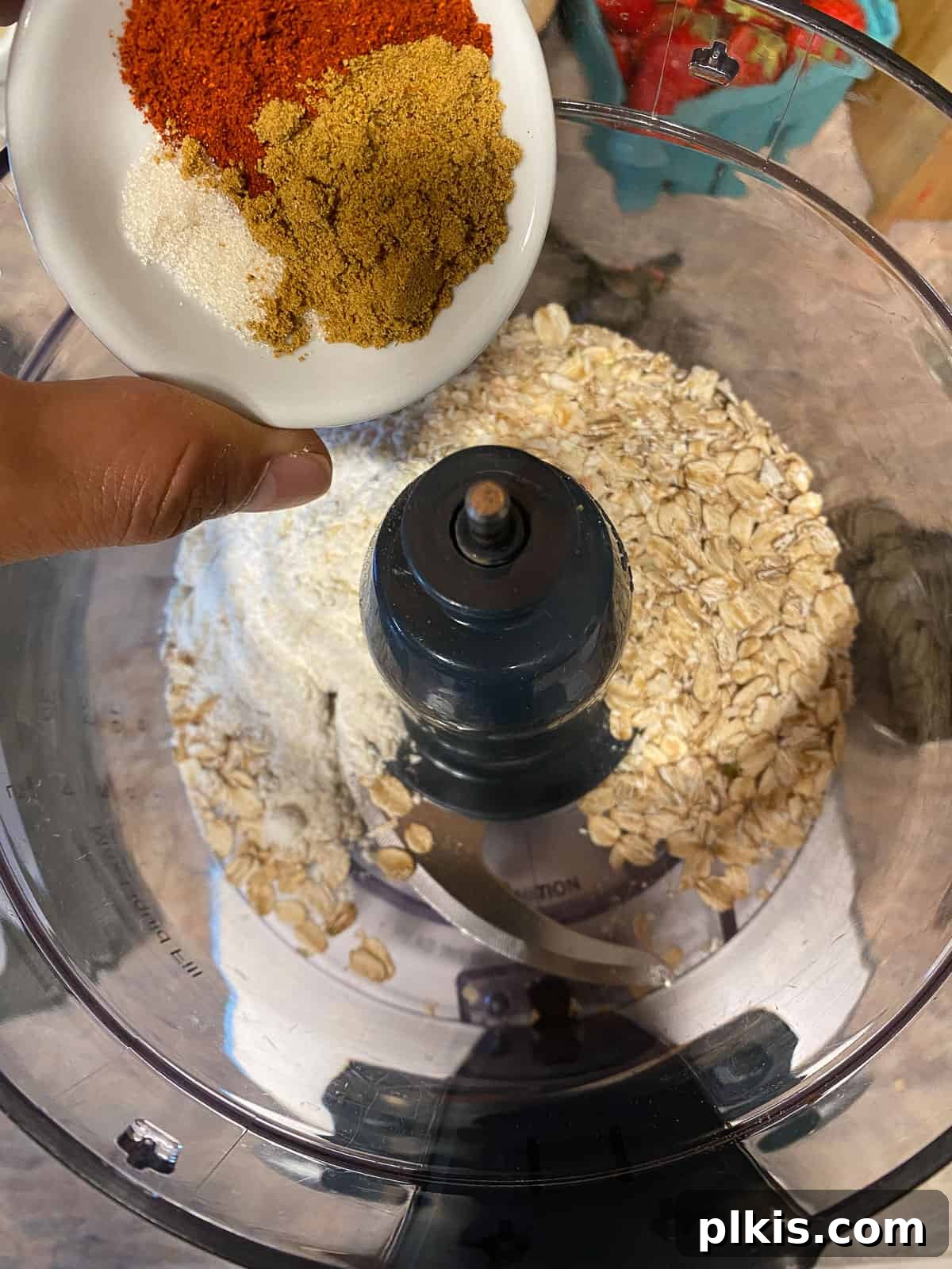 Hearty Plant-Based Lentil Street Tacos 8 process shot of adding spices to food processor