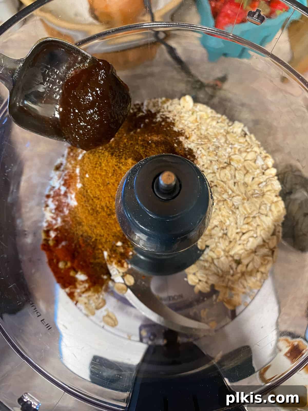 Hearty Plant-Based Lentil Street Tacos 10 process shot of adding ingredients to food processor
