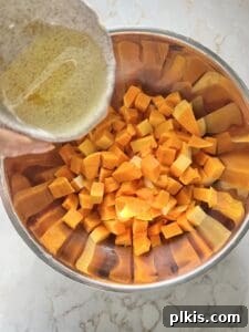 Curried Butternut Squash Roast 5 Step 2: Butternut squash cut in half, revealing seeds