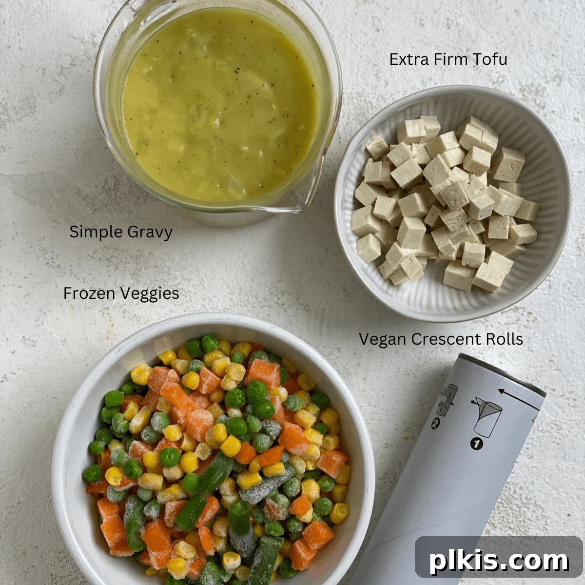 Precisely measured ingredients for Mini Vegan Pot Pies arranged neatly on a white background, ready for assembly.