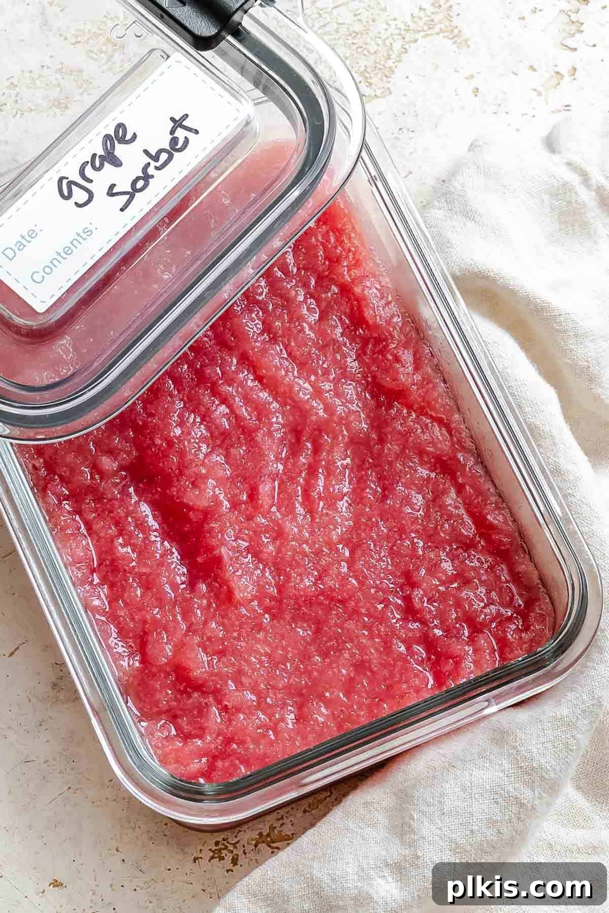 Ruby or Jade Grape Sorbet 10 Completed Easy Grape Sorbet (Red or Green) in a storage container.