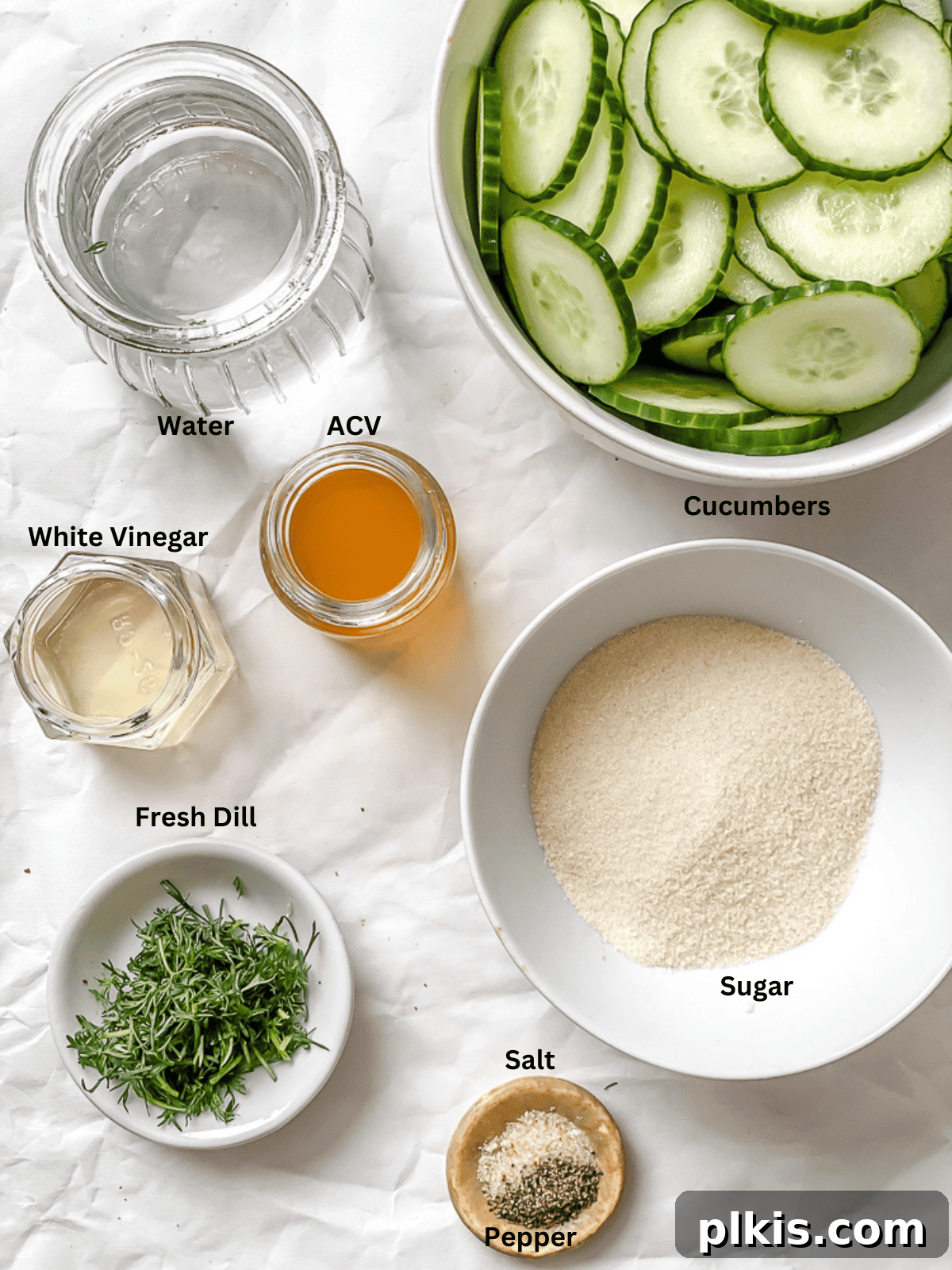 Crisp Cucumber Dill Delight 3 Individual bowls of ingredients laid out for making cucumber dill salad, including sliced cucumbers, fresh dill, vinegars, and sugar.