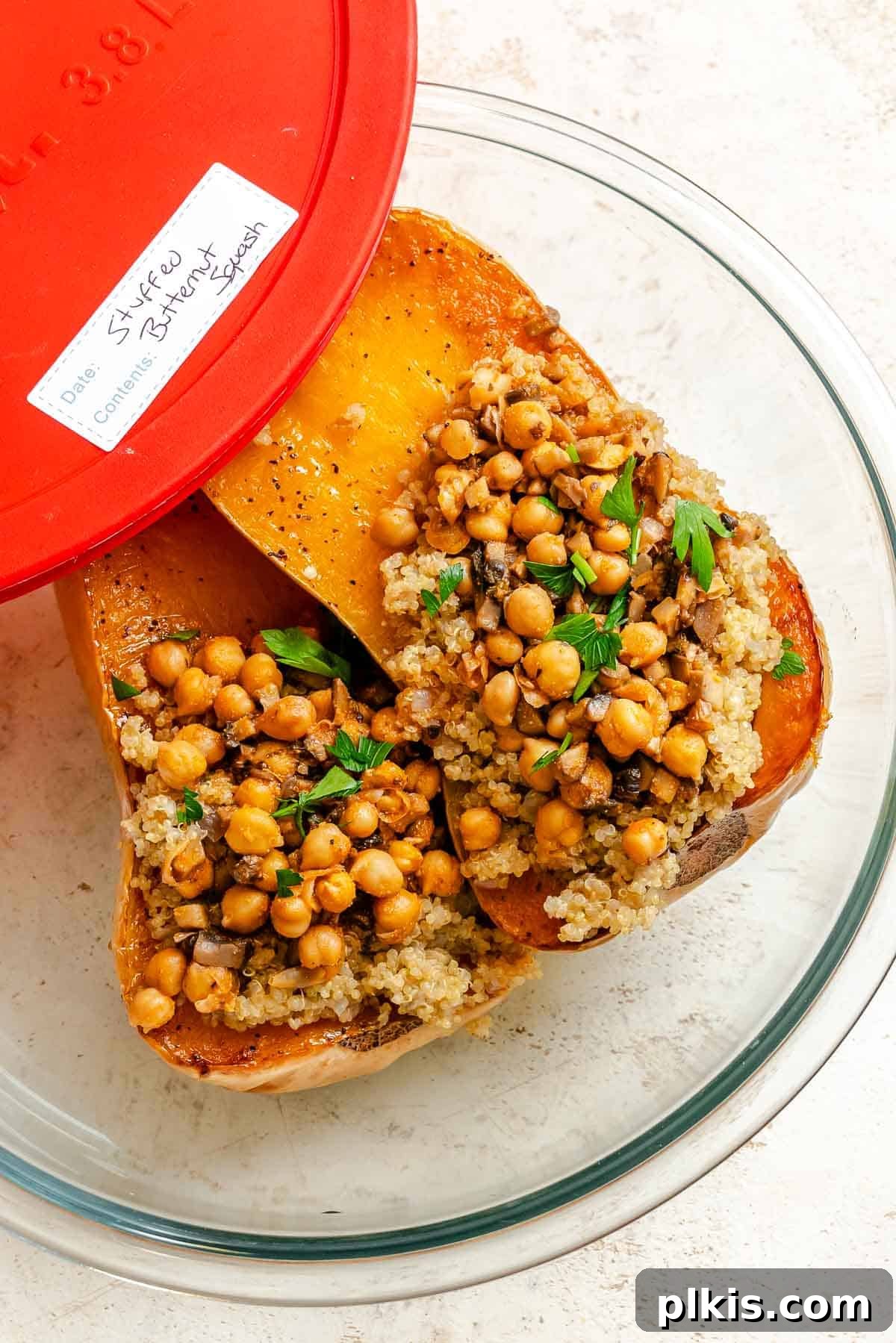 Wholesome Vegan Butternut Squash Boats 10 Completed Vegan Stuffed Butternut Squash in a storage container, ready for refrigeration.