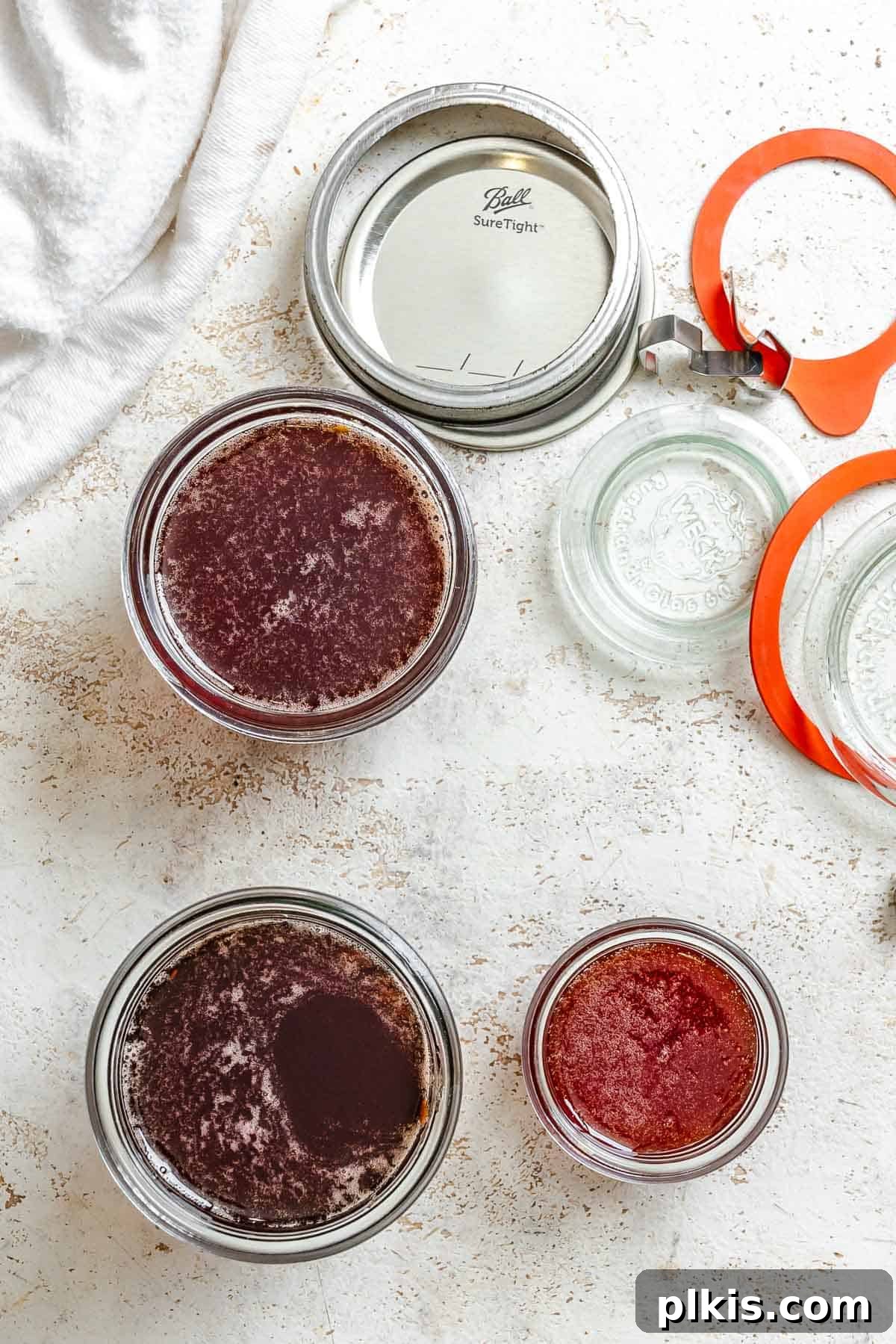 Effortless Pectin-Free Grape Jam 7 Process shot showing canning grape jam.