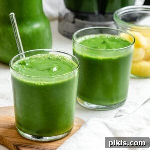 Emerald Pineapple Splash 10 Two glasses of completed Kale Pineapple Smoothie