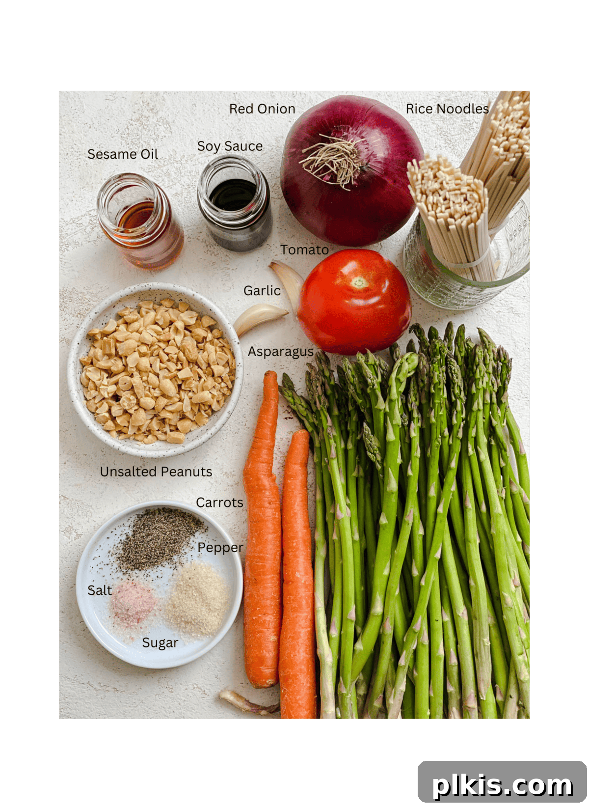 Vibrant Veggie Noodle Medley 3 ingredients for Vegetable Noodle Stir Fry measured out against a white surface