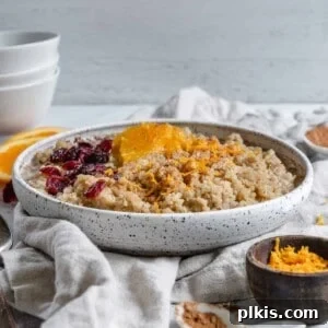 completed Cinnamon Orange Quinoa in a bowl against a light surface