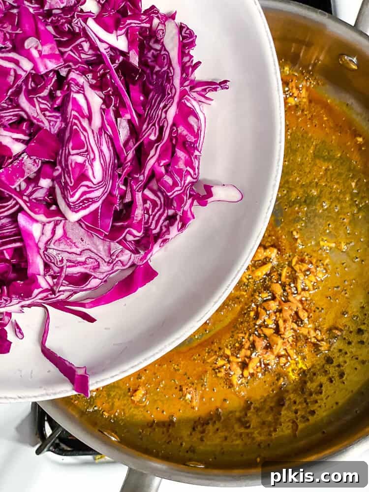 Sautéed Red Cabbage: Fresh Takes and Twists 6 process shot of adding cabbage to pan