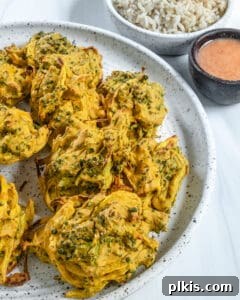 Crispy Broccoli Onion Pakora Bites 8 completed broccoli and onion pakora plated