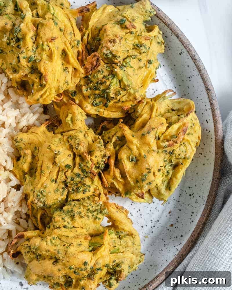 Crispy Broccoli Onion Pakora Bites 10 completed broccoli and onion pakora plated