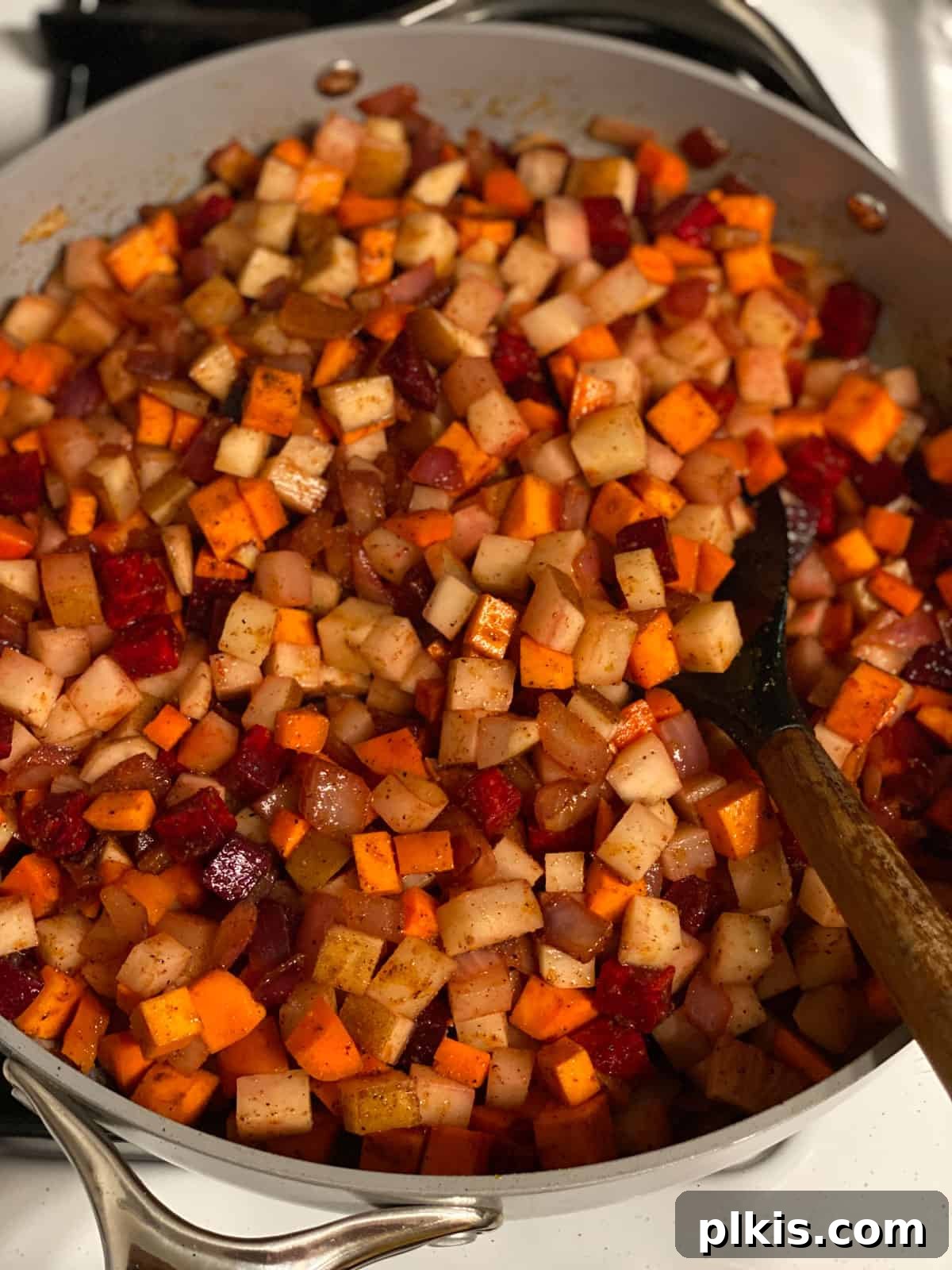 One-Pan Roasted Root Vegetable Medley 9 The root vegetables cooking and browning beautifully in the skillet, almost ready for serving.
