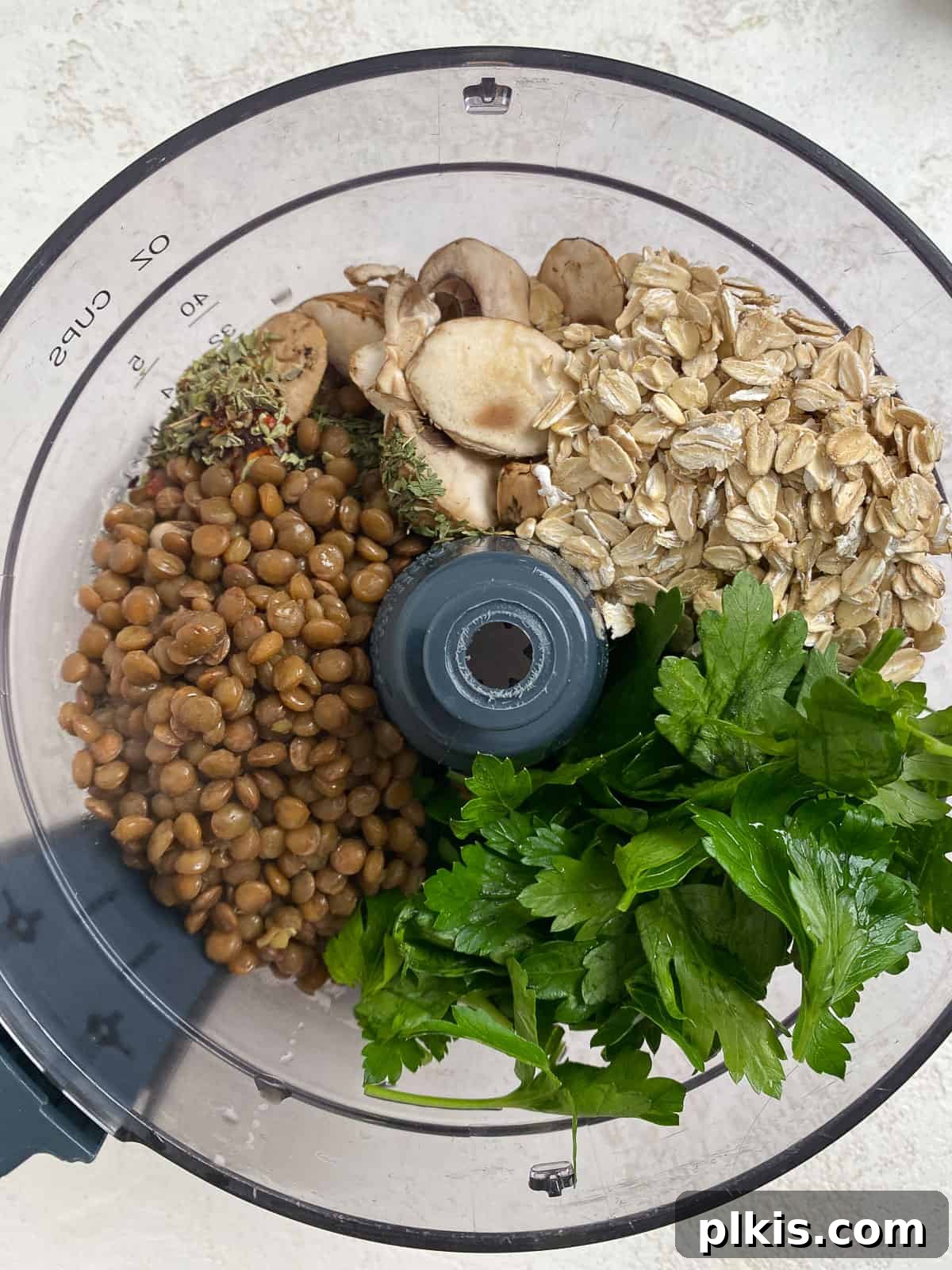 Mighty Lentil Meatballs 7 process shot of ingredients added to food processor for Vegan Lentil Meatballs