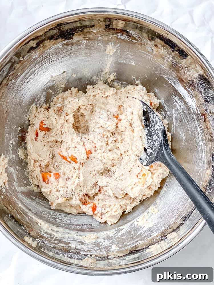 process shot showing mixing batter for persimmon bread in bowl