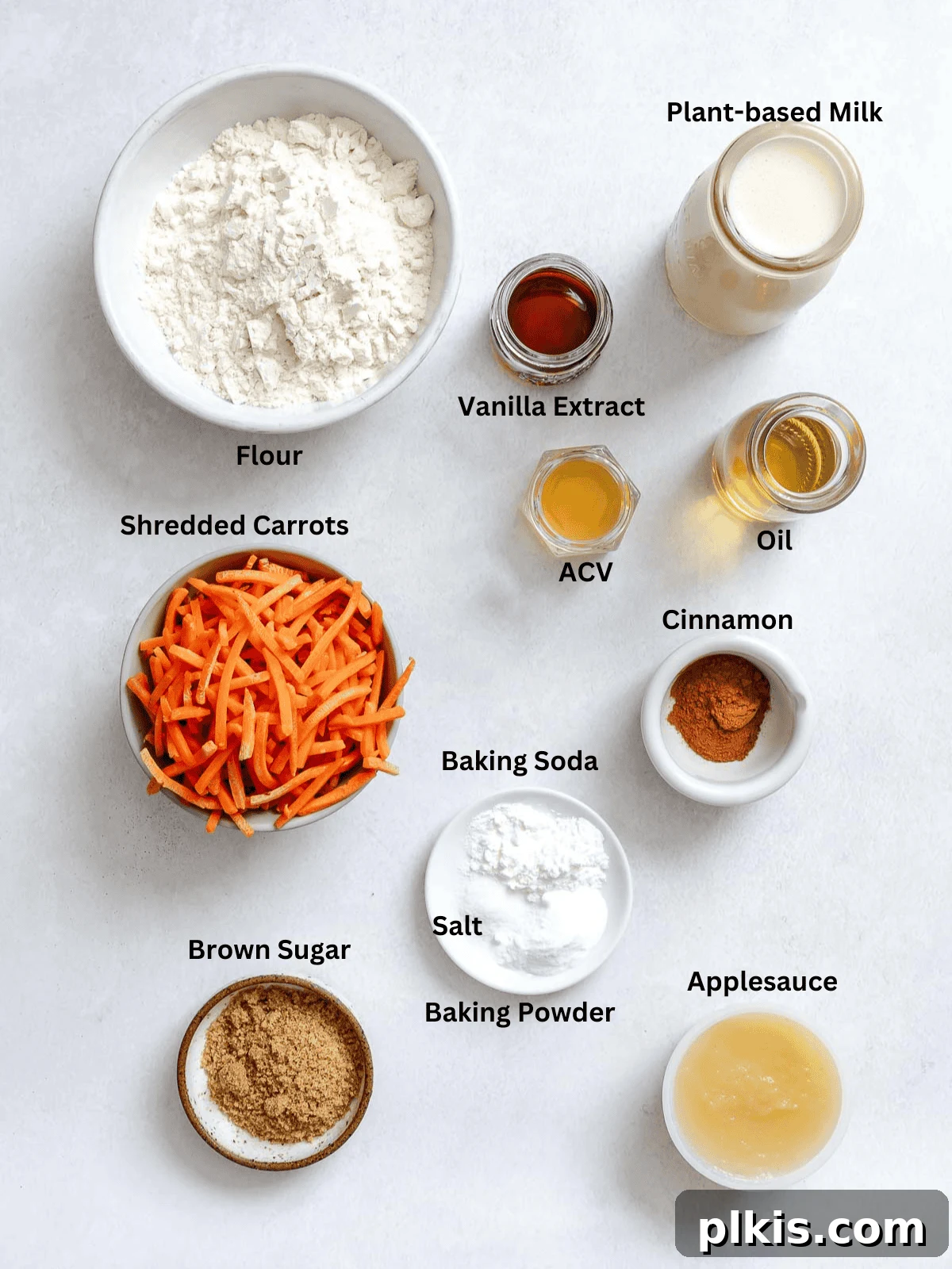 Spiced Carrot Cake Pancakes 3 Ingredients for Carrot Cake Pancakes measured out on a white surface.