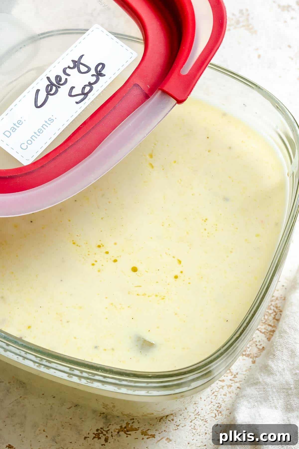 Velvety Celery Soup 9 Completed Cream of Celery Soup in a storage container, ready for meal prep.