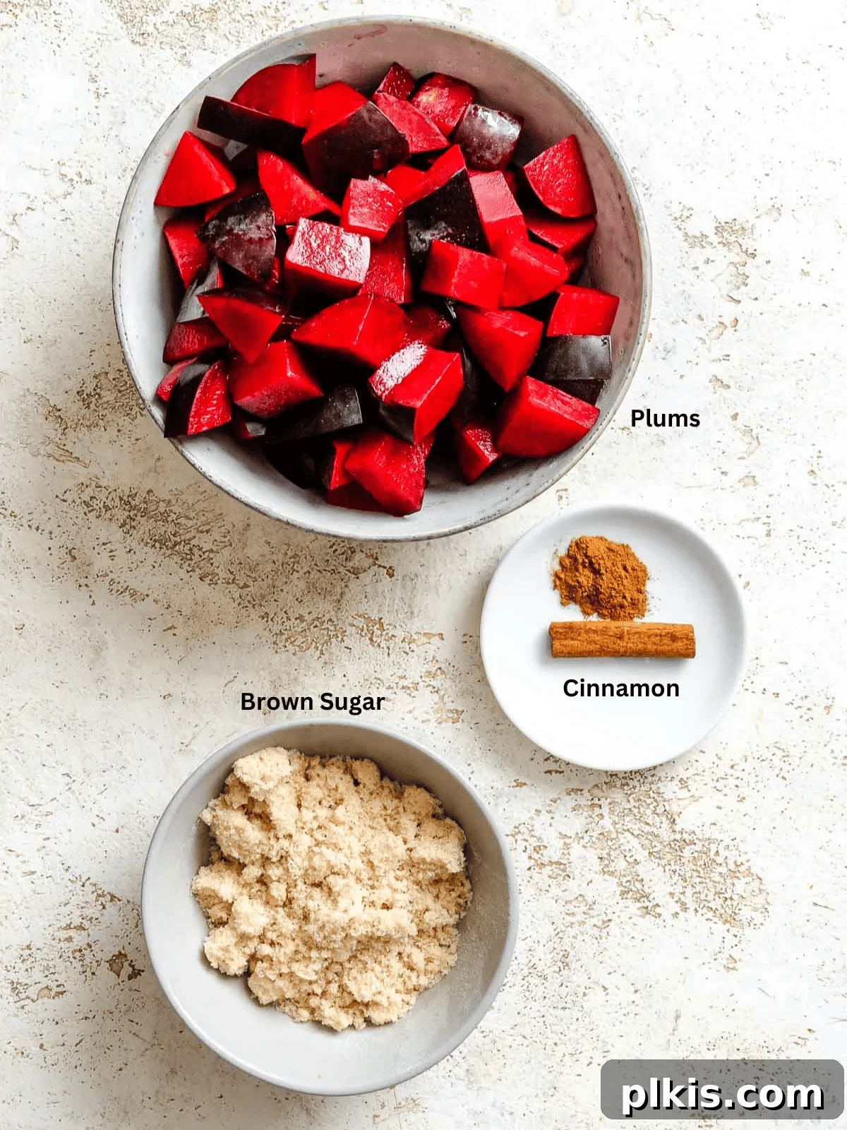 Homemade Plum Jam Without Pectin — Simple Stove-Top Recipe 3 Ingredients for Easy Plum Jam (No Pectin) measured out on a white surface.