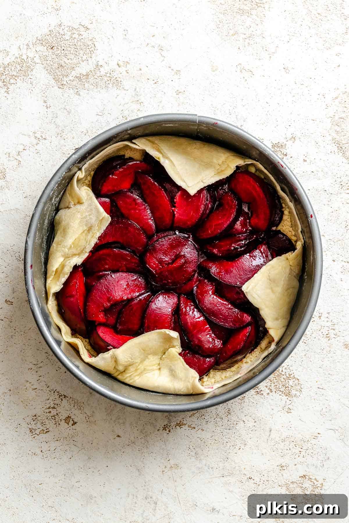 Classic Plum Galette Recipe: Homemade Rustic Tart with Fresh Plums 9 Process shot showing design made for Easy Plum Tart (Plum Galette).