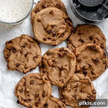 Soft Chewy Banana Bread Cookies Recipe 12 completed Chickpea Chocolate Chip Cookies on a white surface