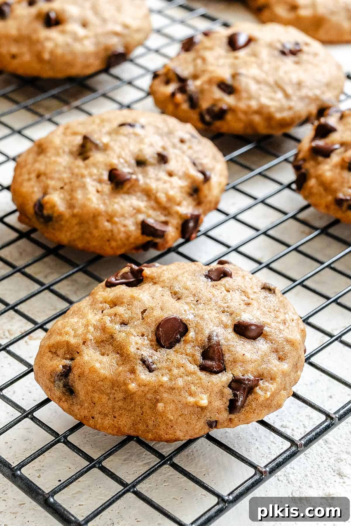 Soft Chewy Banana Bread Cookies Recipe 9 Completed Banana Bread cookies on a storage rack.