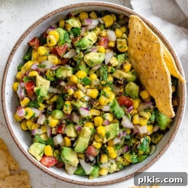Fresh Strawberry Salsa: Sweet, Tangy Summer Recipe 13 completed Roasted Chili Corn Salsa (2 Ways) in a bowl