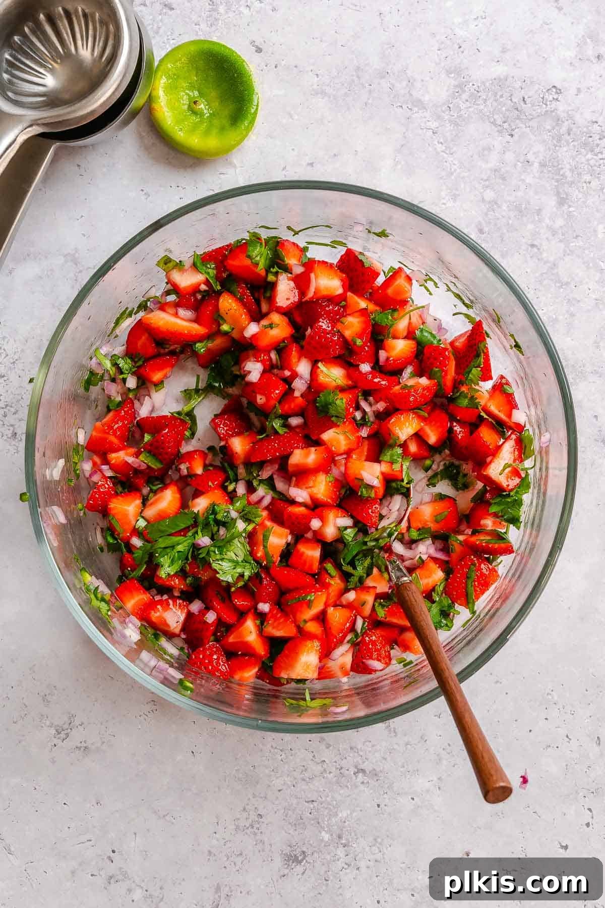 Fresh Strawberry Salsa: Sweet, Tangy Summer Recipe 7 Process shot showing ingredients in a bowl.