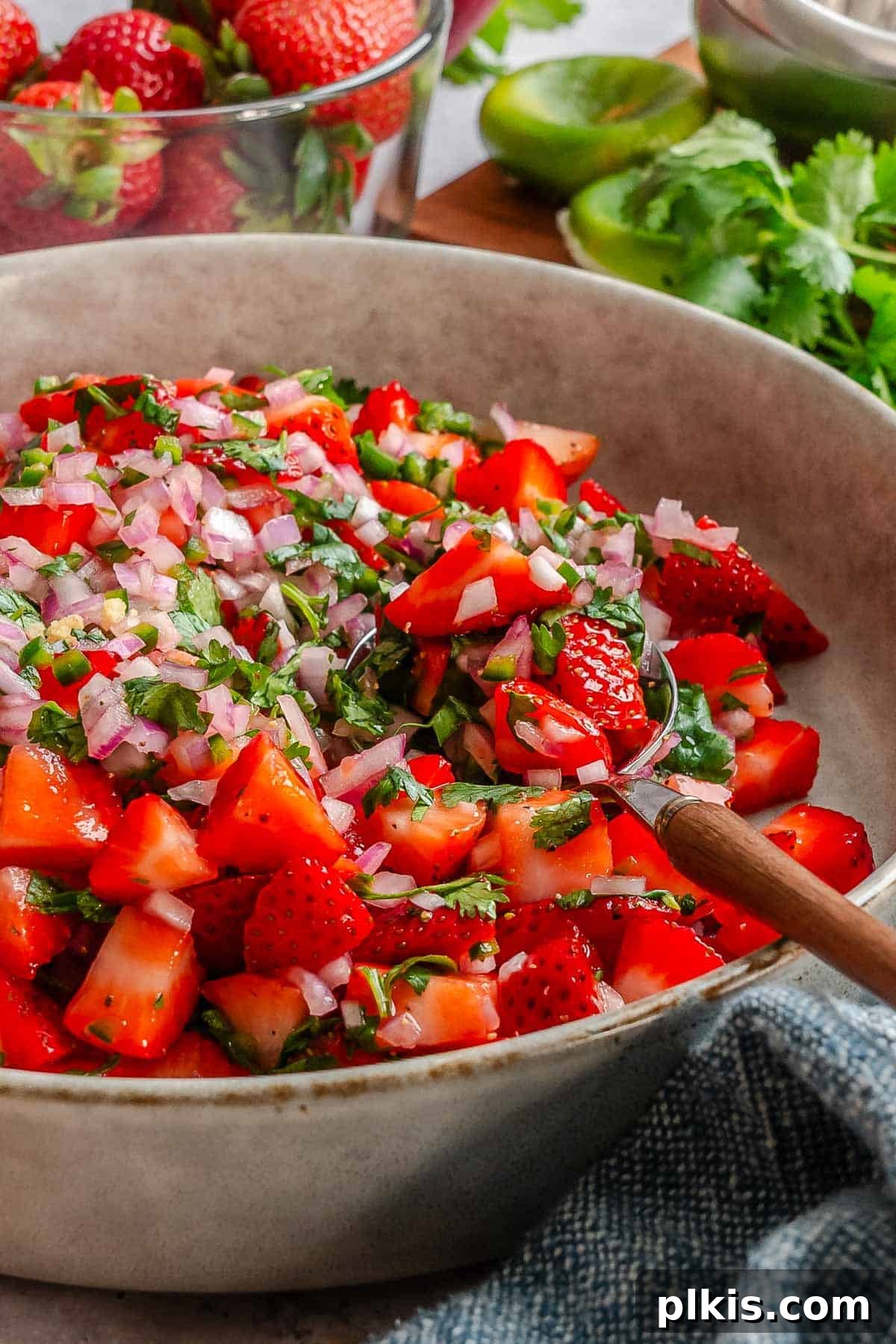 Fresh Strawberry Salsa: Sweet, Tangy Summer Recipe 8 Completed strawberry salsa in a bowl.