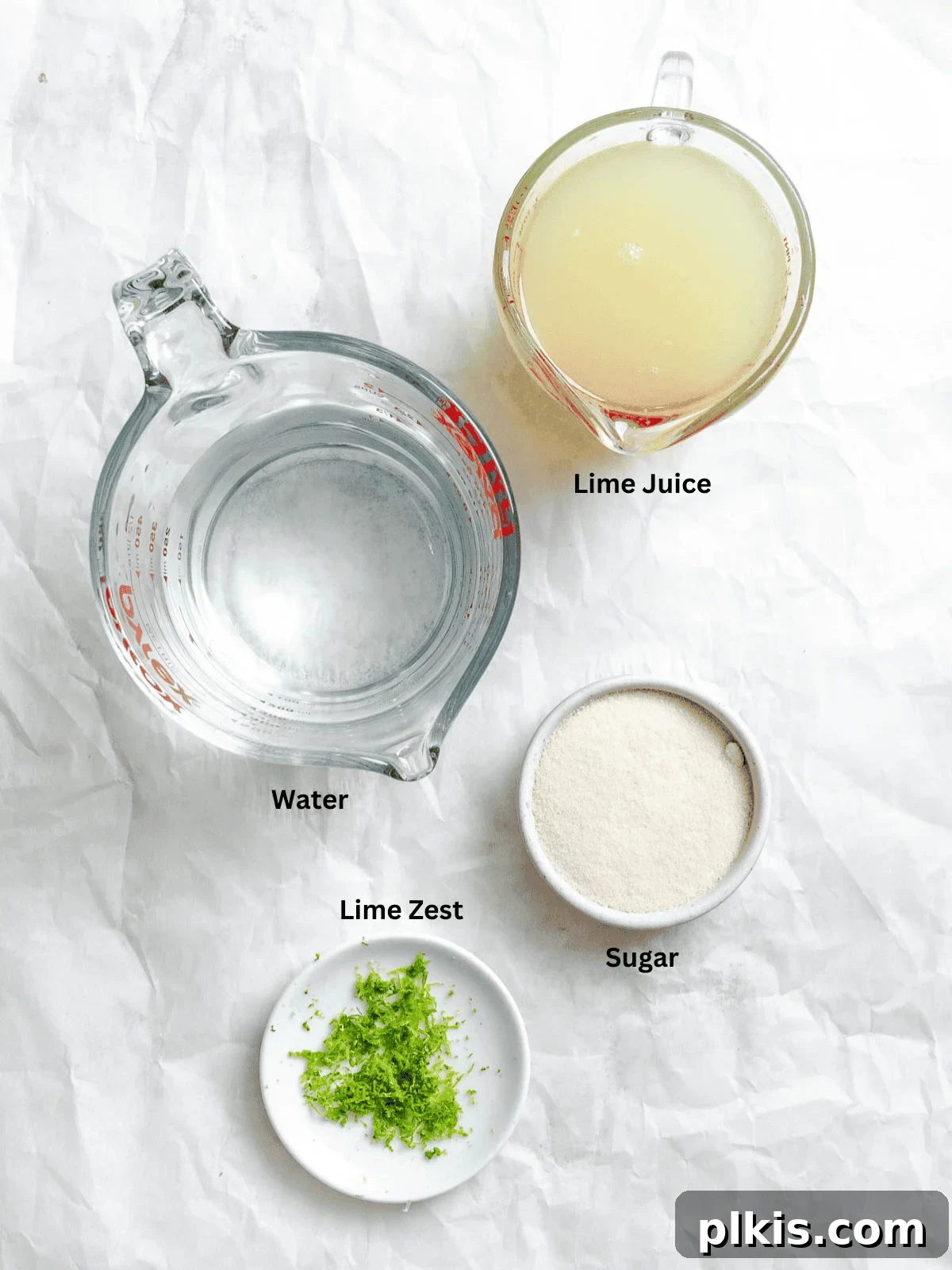 Homemade Zesty Lime Popsicles Recipe 3 Ingredients for Easy Lime Popsicles measured out on a white surface.