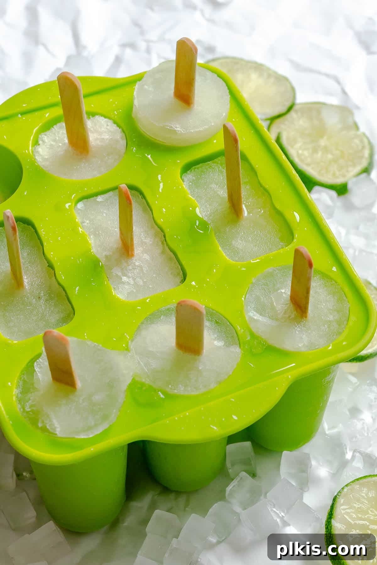 Homemade Zesty Lime Popsicles Recipe 6 Several completed Easy Lime Popsicles in popsicle mold.