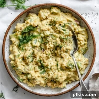 Roasted Cauliflower Salad with Lemon & Herbs 10 completed Easy Curried Chickpea Salad on a plate