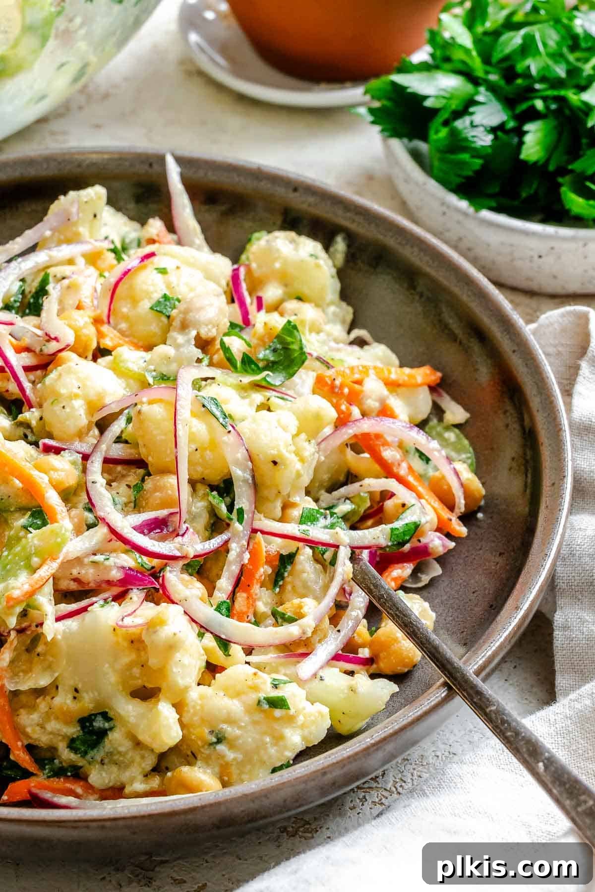 Roasted Cauliflower Salad with Lemon & Herbs 6 Completed Cauliflower Salad in a bowl.