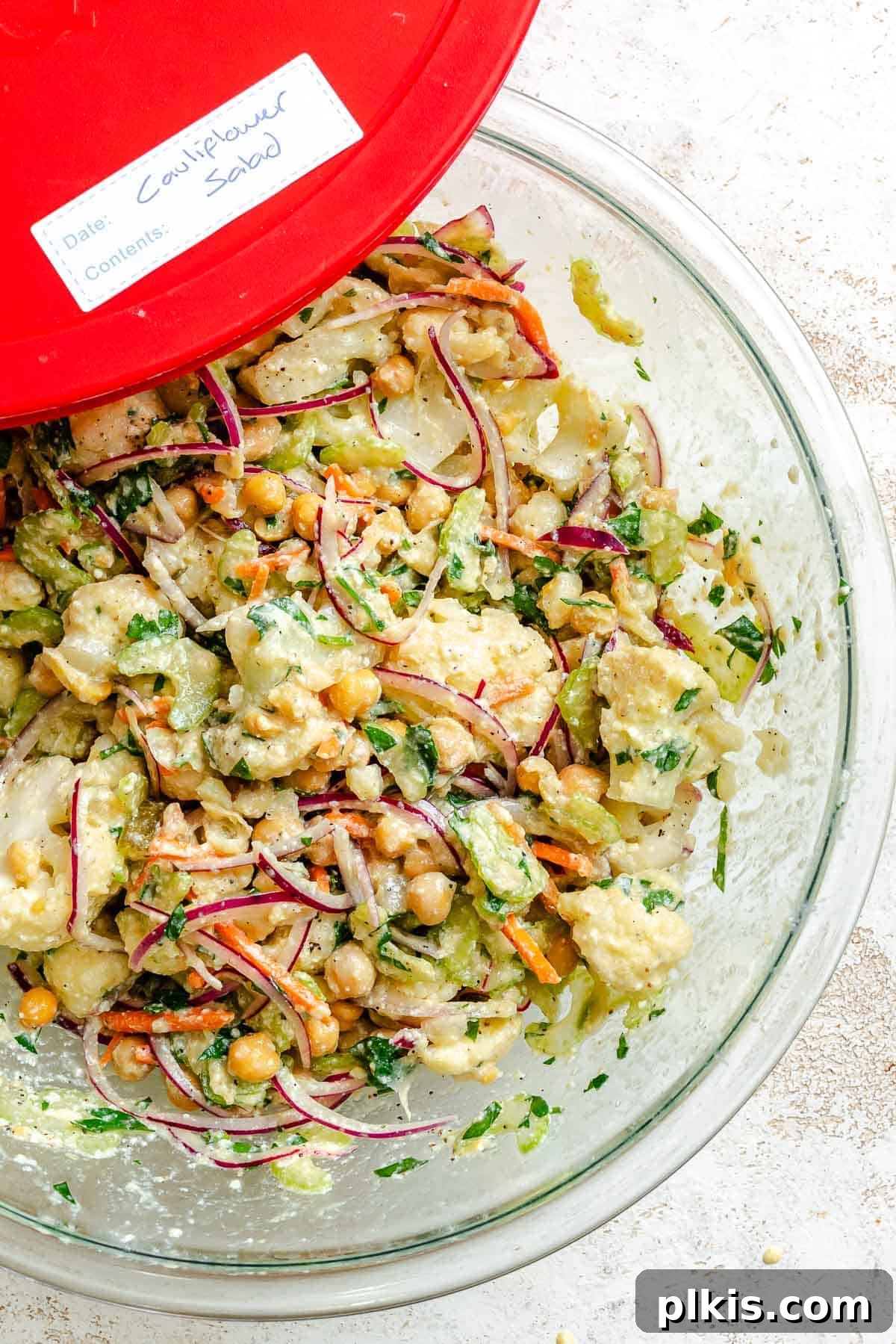 Roasted Cauliflower Salad with Lemon & Herbs 7 Completed Cauliflower Salad in a storage container.