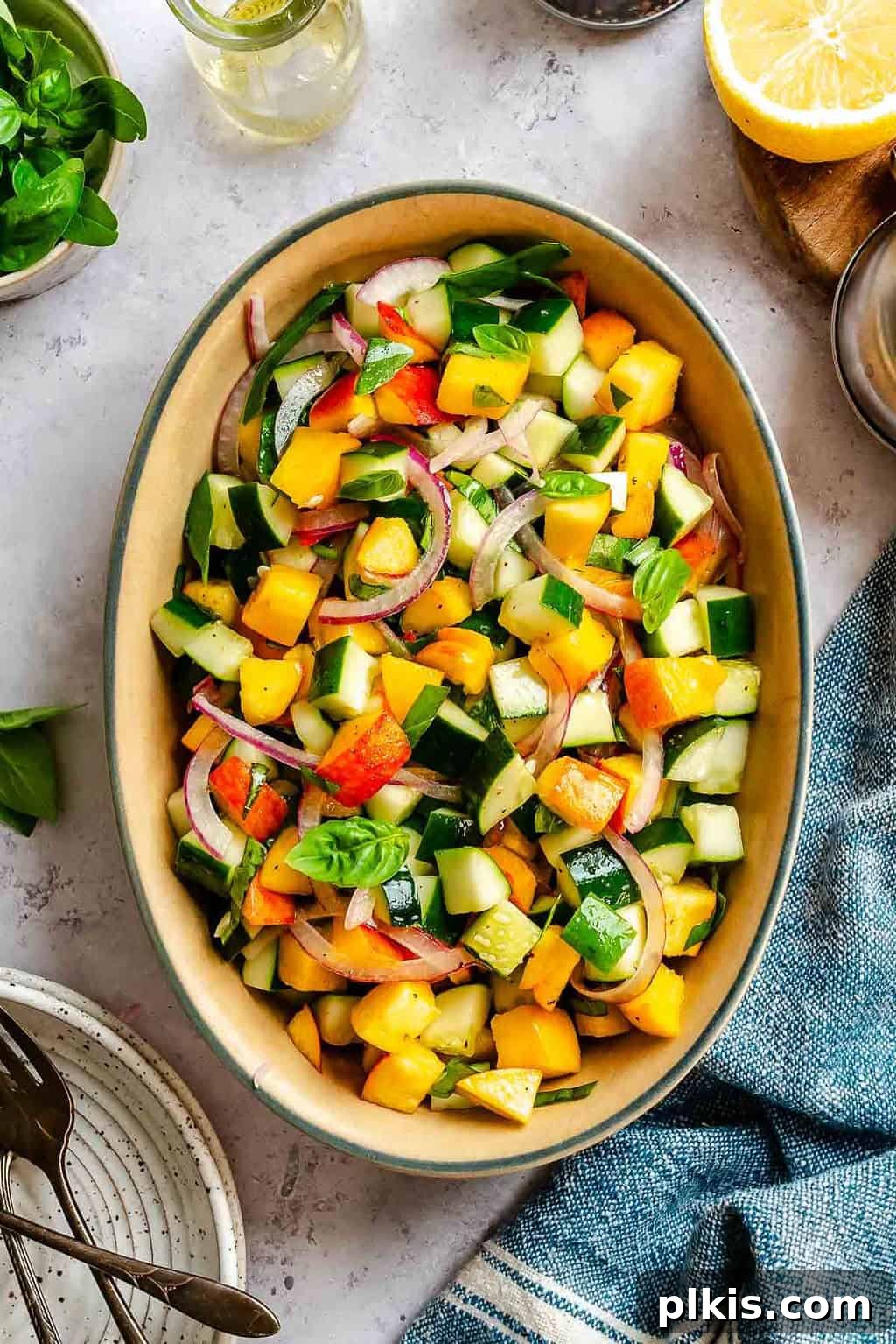 Cucumber and Peach Salad with Mint Lemon Vinaigrette 2 Completed Cucumber Peach Salad in a bowl.