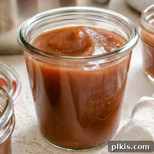 Completed Instant Pot Apple Butter in a jar.