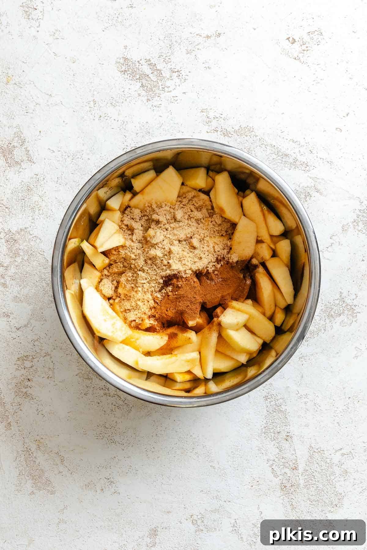 Process shot showing ingredients being added to instant pot.