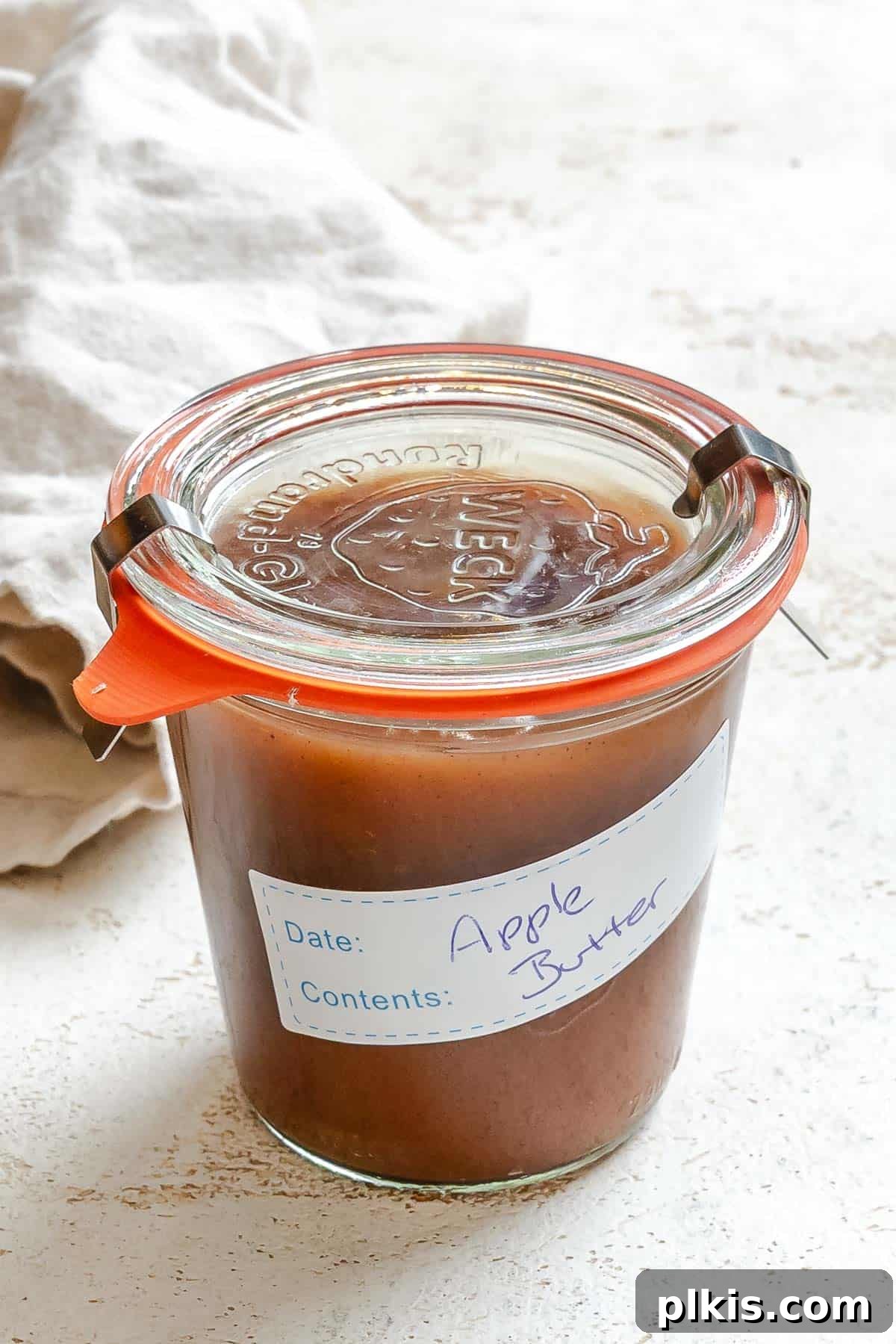 Completed Instant Pot Apple Butter in a jar.