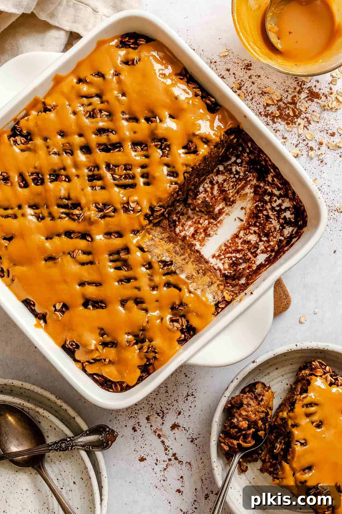 Chocolate Banana Baked Oatmeal with Peanut Butter Swirl 2 Completed Chocolate Banana Baked Oatmeal (with peanut butter) in baking dish.