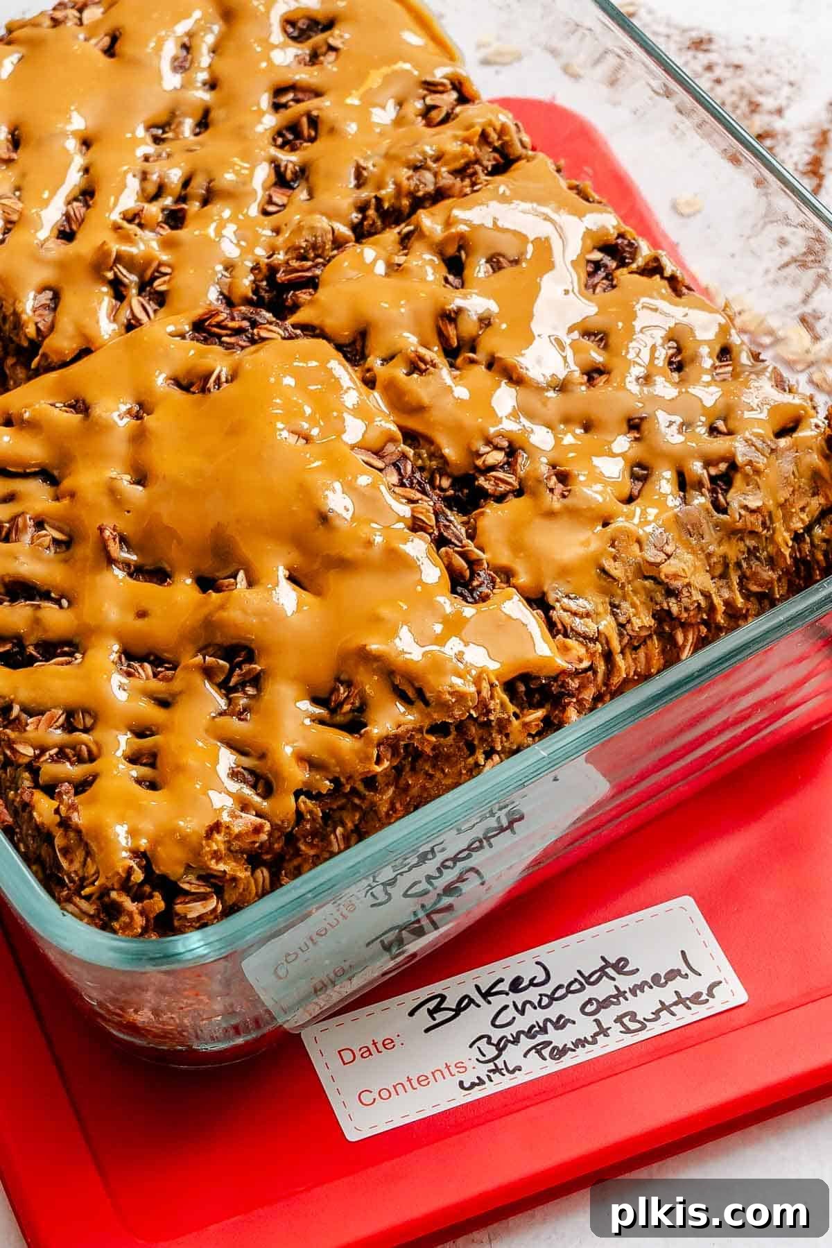 Chocolate Banana Baked Oatmeal with Peanut Butter Swirl 10 Completed Chocolate Banana Baked Oatmeal (with peanut butter) in a storage container.