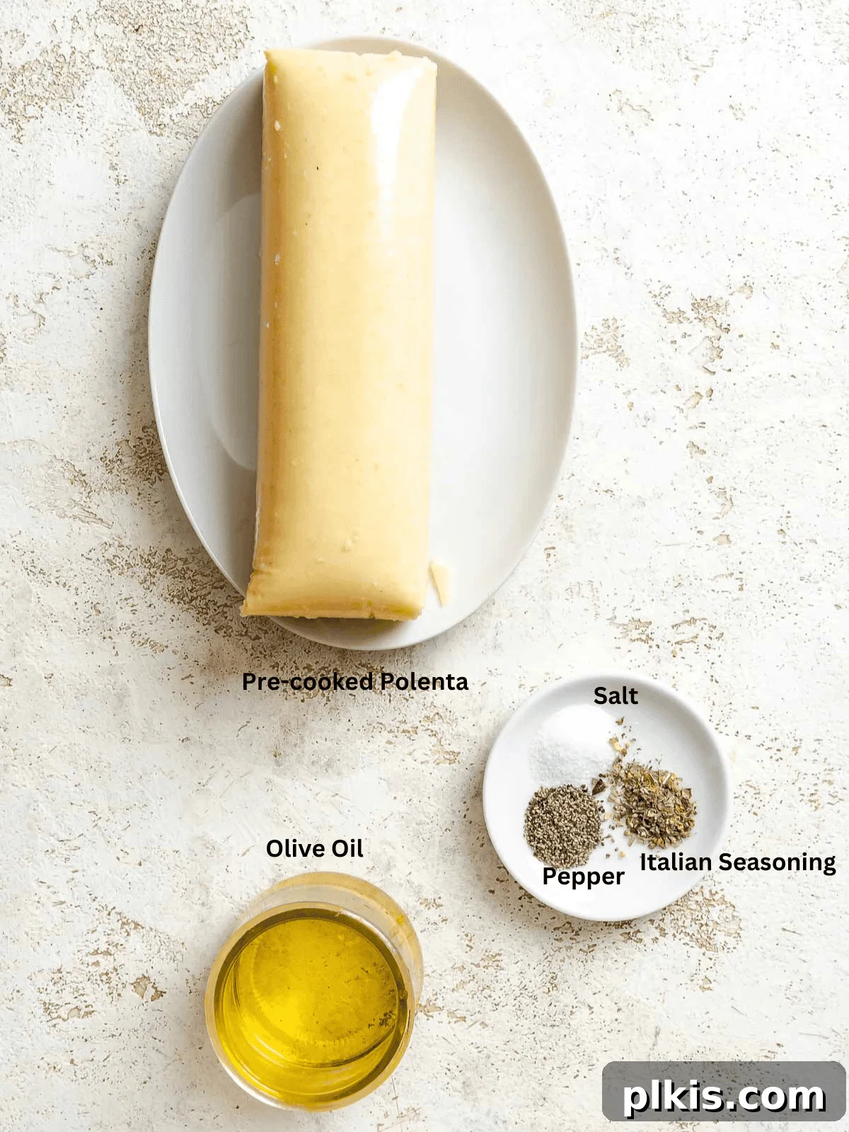 Ingredients for Simple Polenta Fries measured out on a white surface.