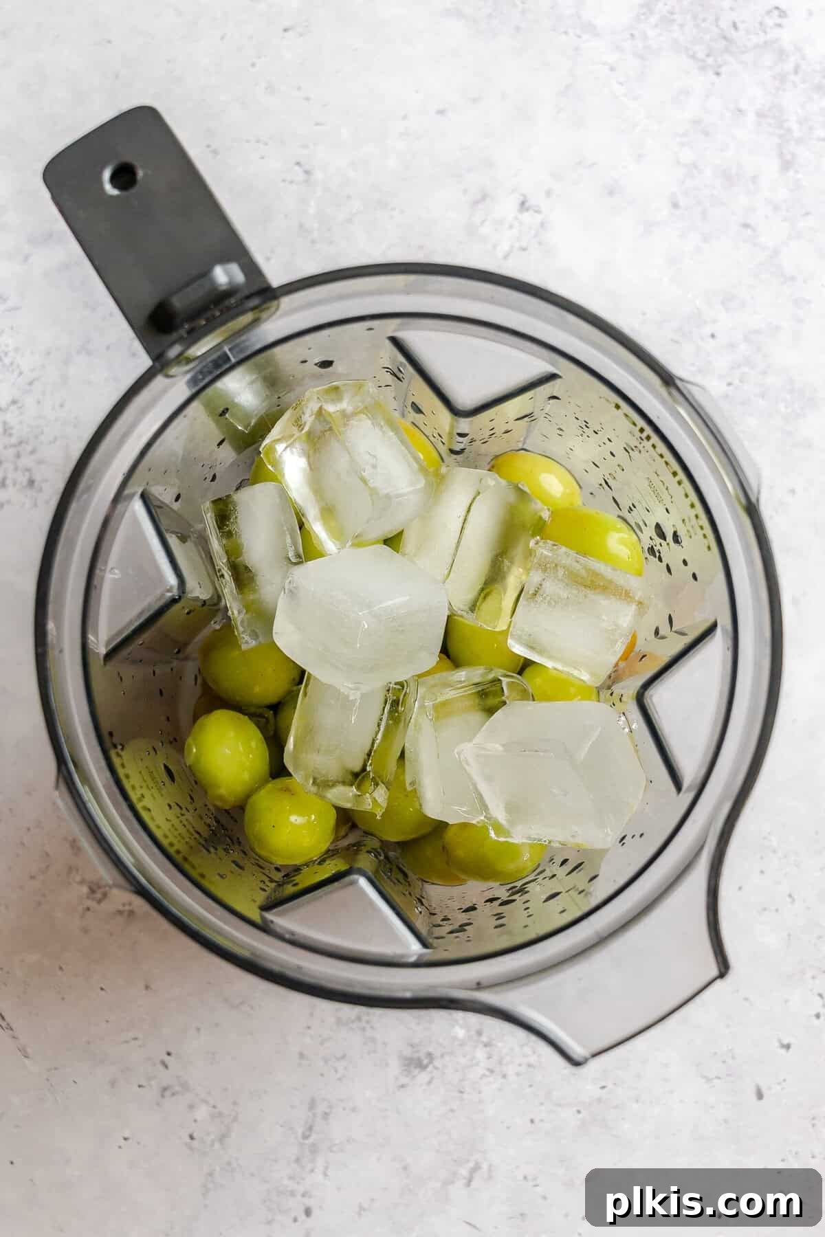 California Grape Lemonade Slushie Recipe for Summer 5 Process shot showing ingredients added to a blender.